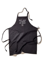 Load image into Gallery viewer, apron with STK logo and &quot;Not Just A Piece of Meat&quot; lettering
