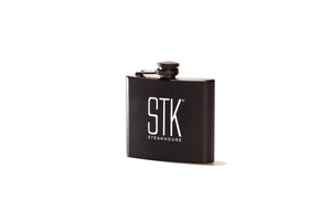 flask with STK Steakhouse logo