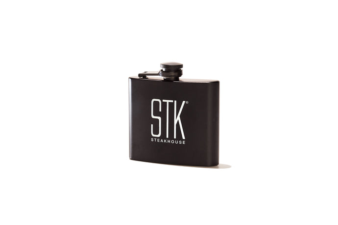 flask with STK Steakhouse logo